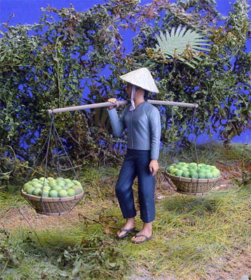 Vietnamese Woman carrying Baskets