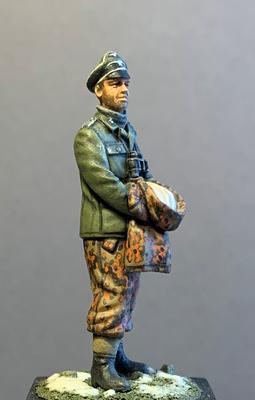 German officer holding parka