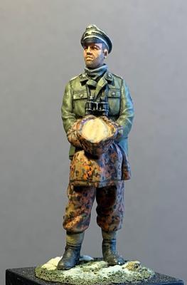 German officer holding parka