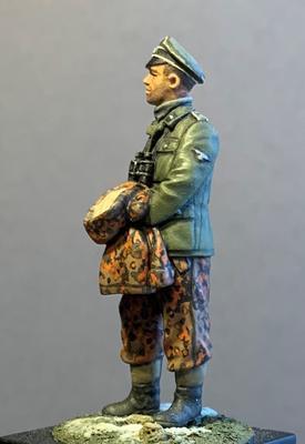German officer holding parka